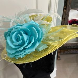 Derby Hat- yellow hat with blue flower and white feathers